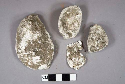 Oyster shell fragments, heavily degraded