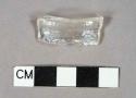 Colorless glass bottle shoulder fragment