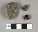 1 burned coal fragment, 2 charcoal fragments