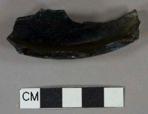 Dark olive green bottle glass base fragment, likely wine bottle