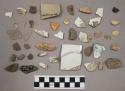 31 pottery; 5 glass fragments; 4 bone fragments; 1 charcoal; 1 fired clay; 30 ch