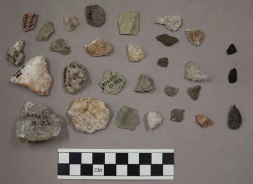 21 chips quartz and limestone; 2 chips stone; 34 chips stone; 2 fragments charco