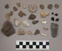17 fragments limestone; 1 fragment stone (spear or arrow point); 63 chips stone;