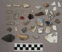 Chipping waste, charcoal, metal, glass, bone, pottery, pottery sherds