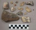 Approx. 100 stone pieces & chips, possibly 2 artifacts; 28 quartz chips, possibl