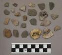 18 pieces stone; 4 quartz pieces; 1 piece unglazed pottery