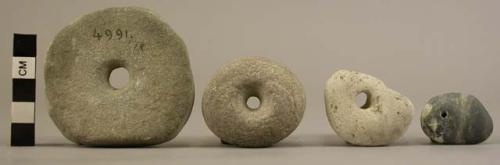 Perforated stones, discoidal & irregular