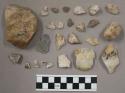 31 quartz pieces; 34 stone pieces; 4 bone frags