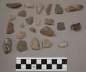 19 stone pieces; 4 quartz pieces; 1 piece unglazed pottery