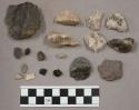 49 stone chips; 3 pieces bone; 2 pcs charcoal; 3 pcs coal (?); 69 pcs quartz; 2