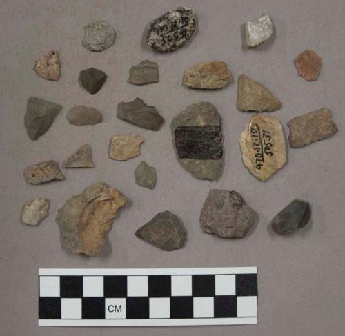 Stone chips; pottery sherd