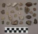 30 quartz pieces; 61 stone pieces; 7 pieces unglazed pottery; 1 piece hard, flin