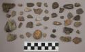 20 pieces unglazed pottery; 110 stone chips and pieces; 17 pieces quartz