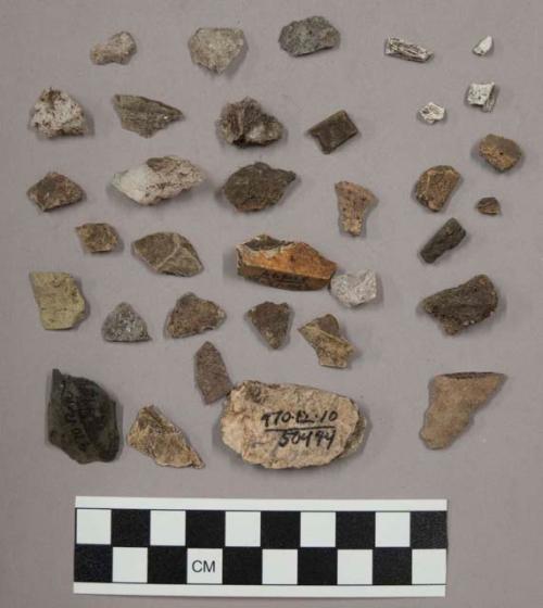 93 stone pieces and chips; 34 pieces quartz; 5 (?) pieces unglazed pottery; 5 pi