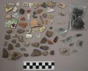 8 glass & fragments, 21 pottery & fragments, 4 pipe bowl and stem fragments, qua