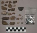 6 fragments bone; 10 bits charcoal; 32 pieces quartz; 9 stone pieces; 193 stone