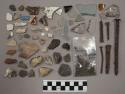 27 pieces corroded metal, mostly nails; 22 pcs glass; 19 pcs glazed pottery; 8 u