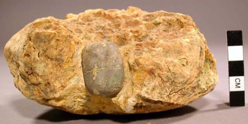 Copal with stone object