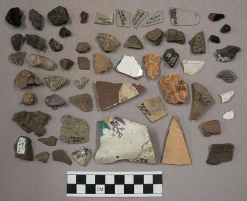 Pottery sherds (1 rim sherd 50902?), 7 glass and fragments, 15 pottery and fragm