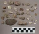 7 bone fragments; 9 quartz pieces; 19 stone pieces and chips