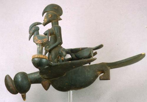 Top of ceremonial staff with birds and female ancestor figure