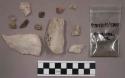 1 bag charcoal bits and dust; 9 pieces stone; 18 pieces quartz and quartz-like m