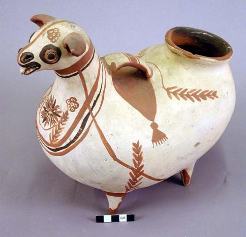 Vessel clay llama effigy with a cream slip.