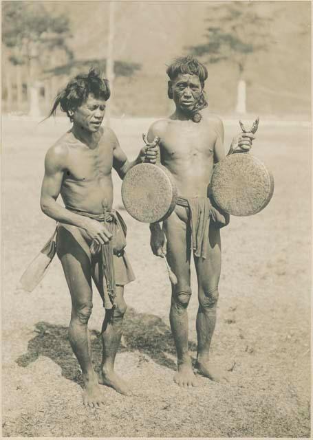 Igorot men performing traditional Bontoc head dance