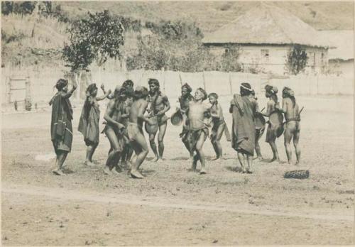 Group of Igorot people performing traditional Bontoc head dance