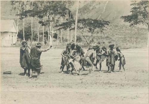 Group of Igorot people performing traditional Bontoc head dance