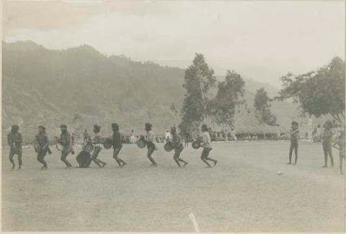 Group of Igorot people performing traditional Bontoc head dance