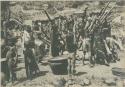 Group of Igorot people performing rice threshing ceremony