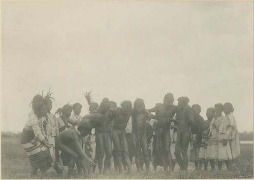 Bontoc Igorot community performing a traditional funeral dance