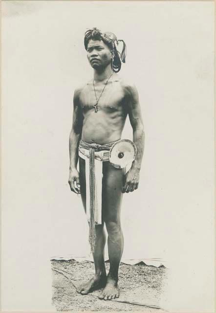 Bontoc Igorot man wearing pearl shell ornament