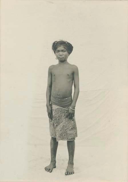 Bontoc Igorot girl wearing skirt woven of bark fiber