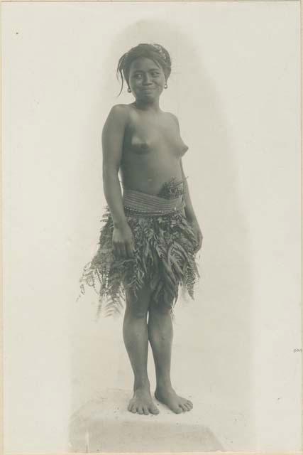 Bontoc Igorot woman wearing leaf covering for work