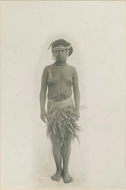 Bontoc Igorot woman wearing leaf covering for work