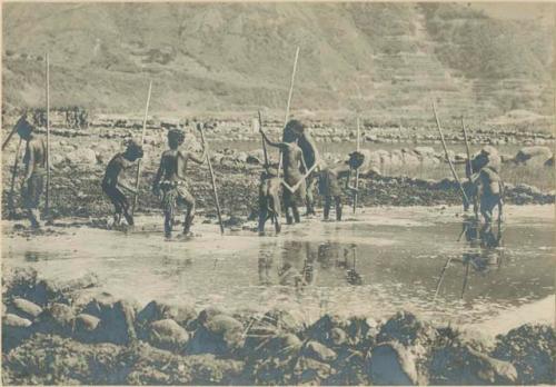 Group of Igorot people preparing rice terrace for planting