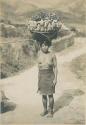 Woman with basket of camotes