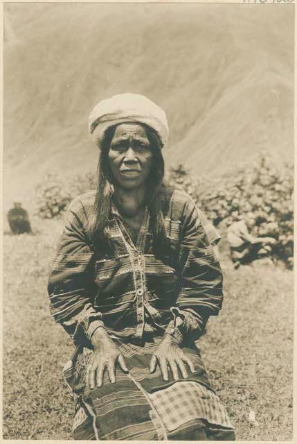 Igorot woman wearing gold ornament