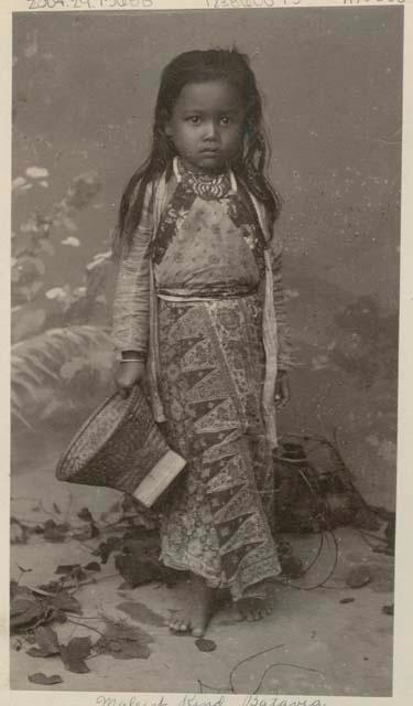 Small girl holding basket