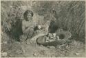 Bontoc Igorot woman washing salt off stones