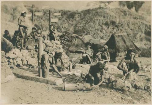 Mayinit residents constructing a sugar mill