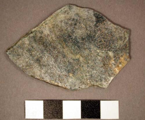 Possible tabular implement, irregular fragment, part of 1 edge worn flat; phylit