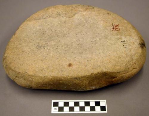 Metate. ovoid, largbe cobble. one surface ground slightly concave to edges. no r