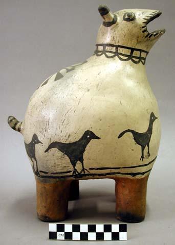 Cochiti effigy pitcher. In shape of animal standing on 4 legs.