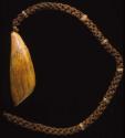 Tabua, ceremonial whale tooth attached to braided cord