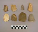 8 flint flakes, including cream, tan, grey and brown colored stone