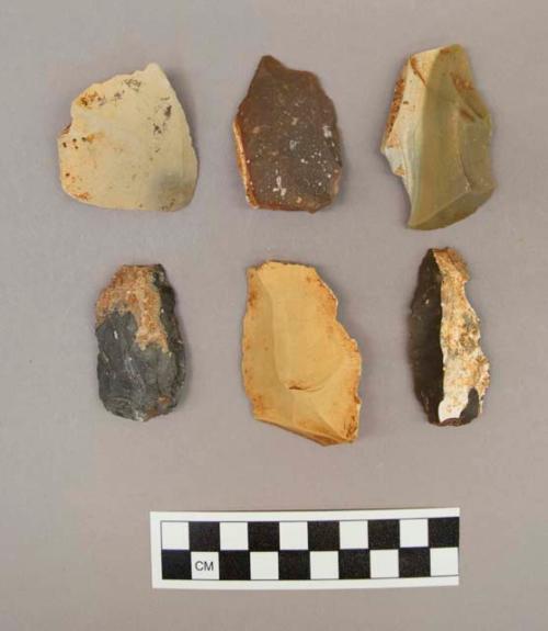 79 flint flakes, including grey, tan, cream, brown, and reddish brown colored stone (some with cortex)