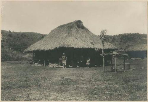 Igorot people in front of house at Pico